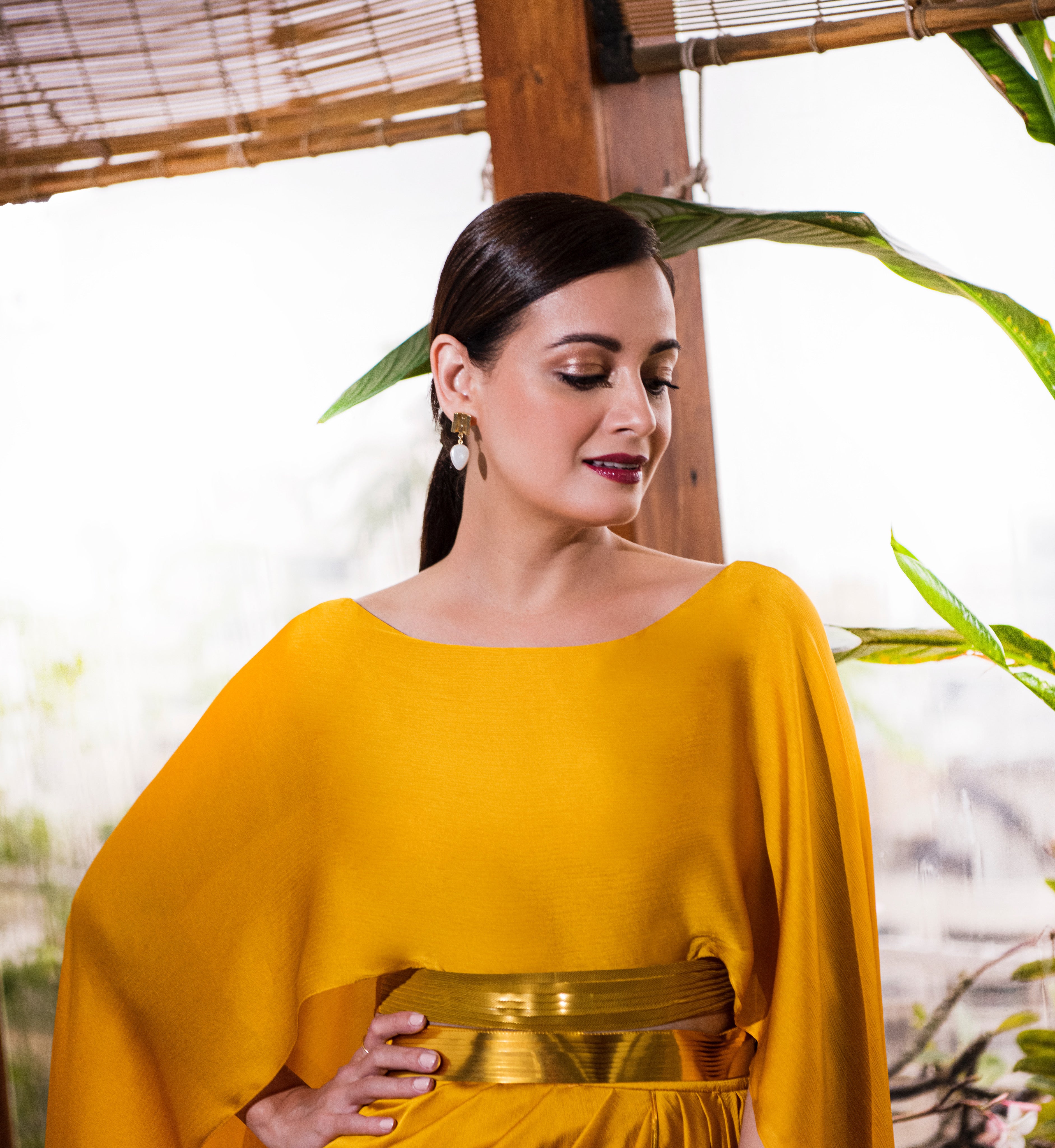 Buy Yellow Dresses, Gold Earrings, Pumps with Black Clutches Scrapbook Look  by AARUSHI